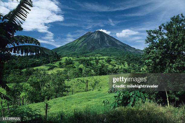 sunny day and arenal volcano, costa rica - costa rica volcano stock pictures, royalty-free photos & images