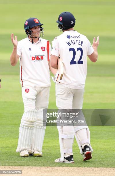 Michael Pepper and Paul Walter of Essex celebrate winning the LV= Insurance County Championship Division 1 match between Hampshire and Essex at Ageas...