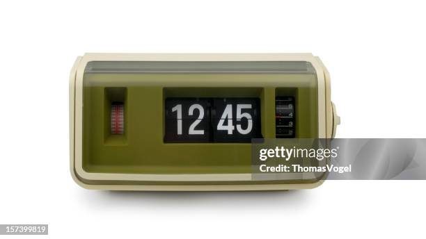 the 70s. digital flip clock - alarm clock close up stock pictures, royalty-free photos & images