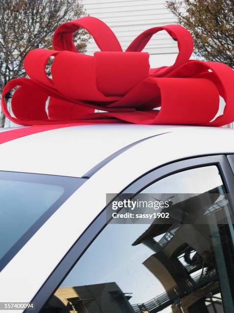 car bow present christmas - tinted window stock pictures, royalty-free photos & images