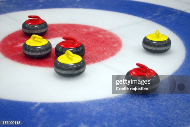 curling target - curling stone stock pictures, royalty-free photos & images