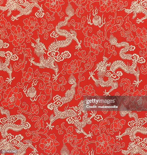 chinese dragon fabric embroidery - asia background stock pictures, royalty-free photos & images