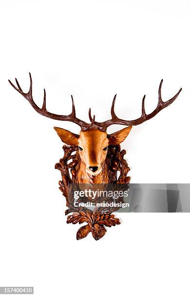 head of a plastic deer - animal head on wall stock pictures, royalty-free photos & images