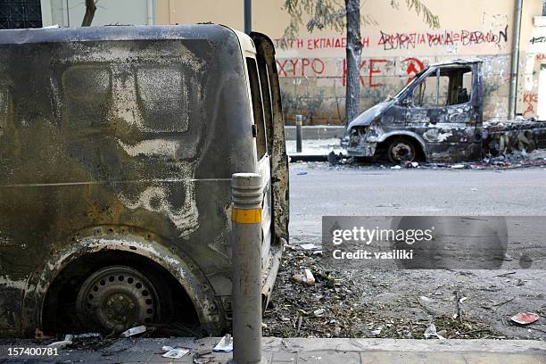 burnt cars - greece riots stock pictures, royalty-free photos & images