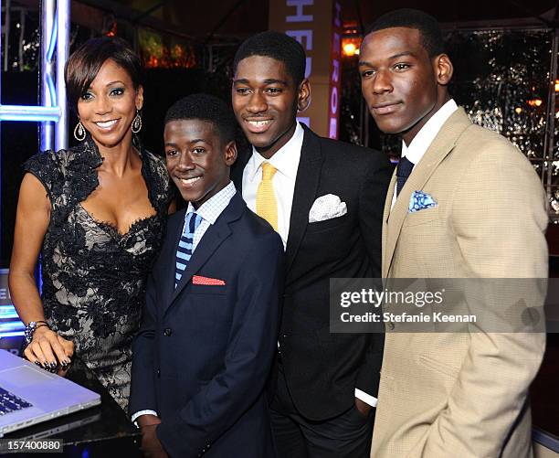 Actors Holly Robinson Peete, Kwesi Boakye, Kwame Boateng, and Kofi Siriboe attend the CNN Heroes: An All Star Tribute at The Shrine Auditorium on...