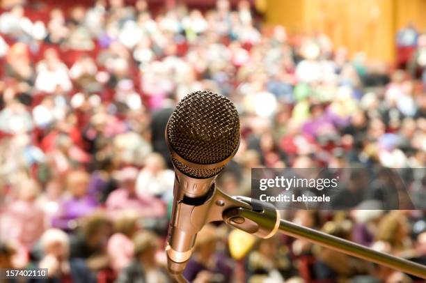 microphone and audience - fame press stock pictures, royalty-free photos & images