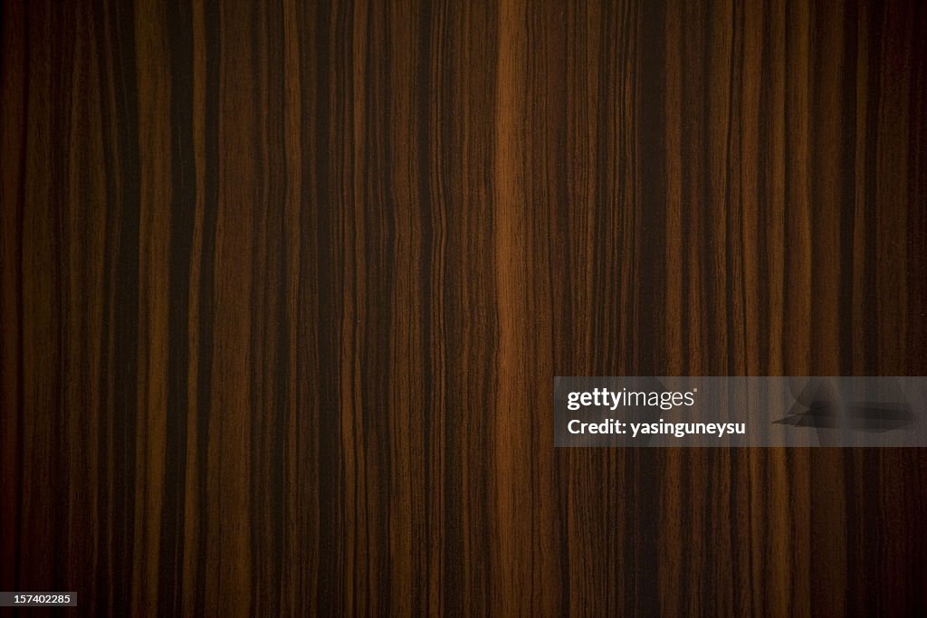 Ebony wood background with vertical stripes