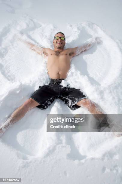 winter snow angel - swimwear stock pictures, royalty-free photos & images