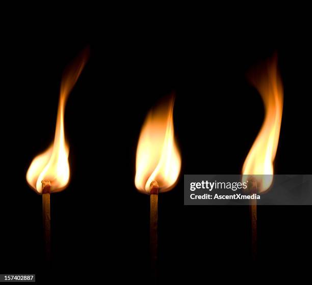 flaming match trio - burning match stock pictures, royalty-free photos & images