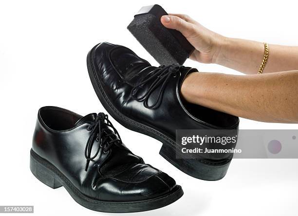 quick shine - polishing shoes stock pictures, royalty-free photos & images