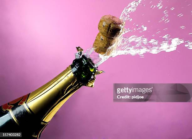 popping champagne cork - sparkling wine stockfoto's en -beelden
