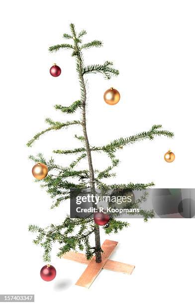 charlie brown-style christmas tree, a symbol of tough economic times? - miniture tree stock pictures, royalty-free photos & images