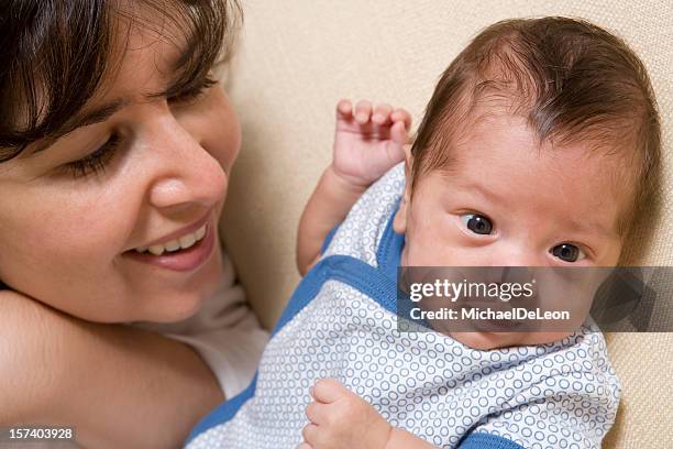 baby and mother - michael virtue stock pictures, royalty-free photos & images