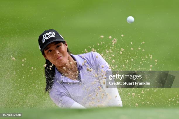 Celine Boutier of France plays her third shot on the 9th hole out of the bunker during the first round of the Amundi Evian Championship at Evian...