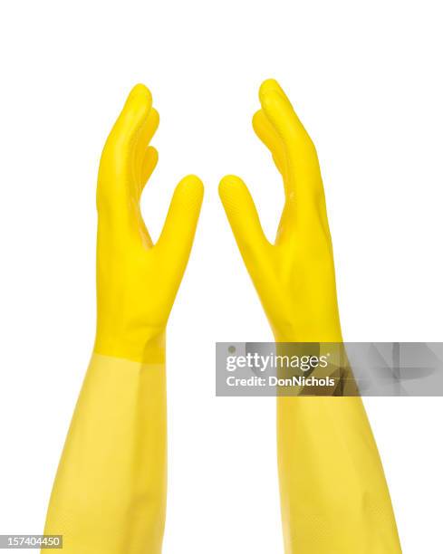 yellow rubber gloves - rubber material stock pictures, royalty-free photos & images
