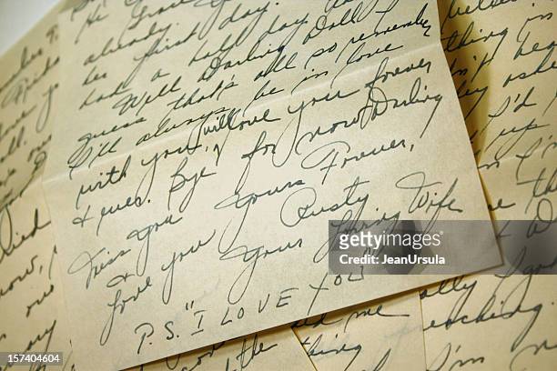 hand written notes ending in ps i love you  - love letter stock pictures, royalty-free photos & images