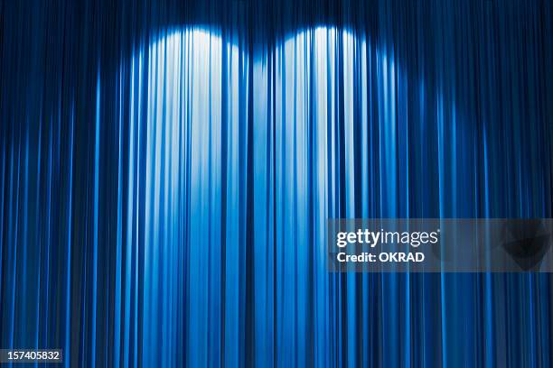 blue stage curtain wallpaper background. - plooikraag stockfoto's en -beelden