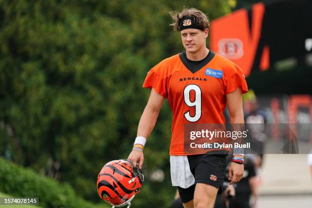 Joe Burrow of the Cincinnati Bengals walks to the field during training camp at Kettering Health Practice Fields on July 26, 2023 in Cincinnati, Ohio.