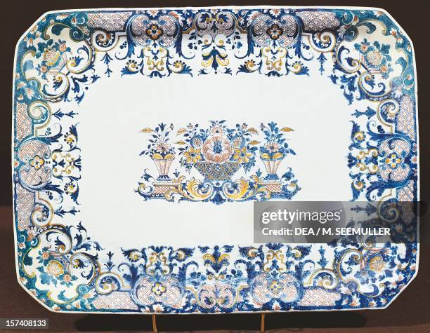 Tray with lambrequin decorations, maiolica enamel, Rouen manufacture, France, 18th century. Sevres, Musée National De Céramique .