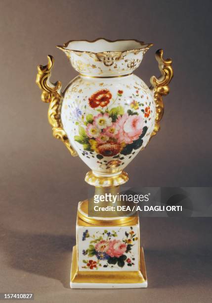 Two-handled vase with floral decorations, ca 1840, porcelain, Limoges manufacture, Limousin. France, 19th century. Florence, Museo Stibbert .