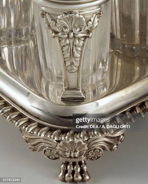 Detail from a set of eight silver cruet bottles, London 1813, William Eaton silversmith. England, 19th century.