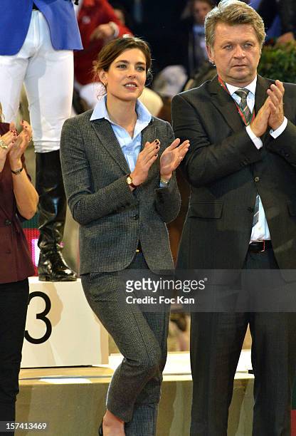 Charlotte Casiraghi and Christophe Ameeuw attend the Gucci Paris Masters 2012 - Day 3 at Paris Nord Villepinte on December 2, 2012 in Paris, France.