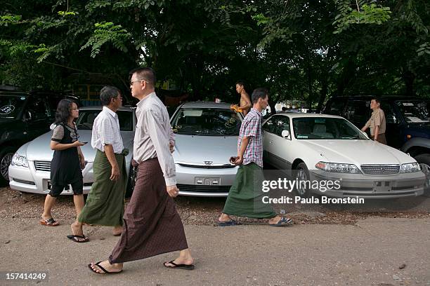 Burmese worker restores a car at the Htoo Auto Service workshop November 29, 2012 Yangon, Myanmar. Import restrictions have been eased, resulting in...