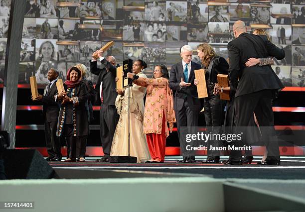 Heroes of 2012 Honorees Thulani Madondo, Razia Jan, Leo McCarthey, Malya Villard-Appolon, Hero of the Year Pushpa Basnet, Host Anderson Cooper, Mary...
