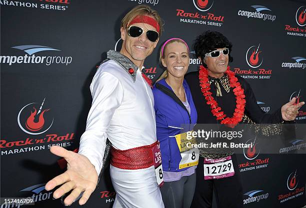 Television personality Kate Gosselin arrives with two Elvis Presley impersonators at the Zappos.com Rock 'n' Roll Las Vegas Marathon and...