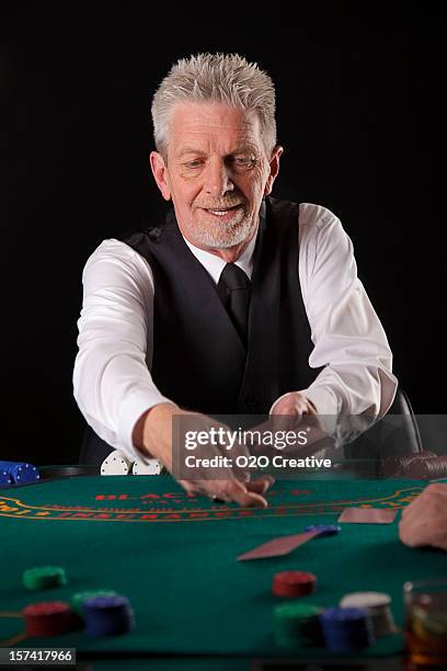 blackjack dealer - dealing cards stock pictures, royalty-free photos & images