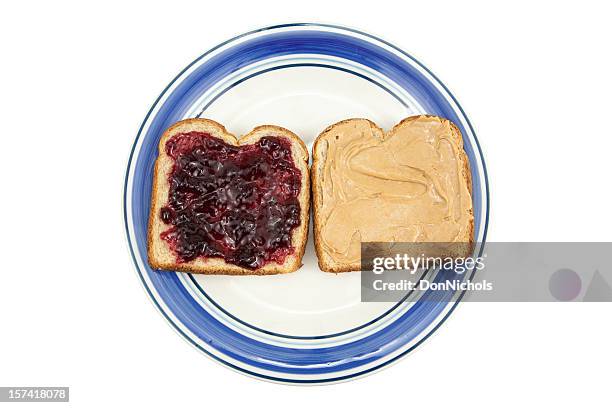 peanut butter and jelly on plate - peanut butter and jelly sandwich stock pictures, royalty-free photos & images