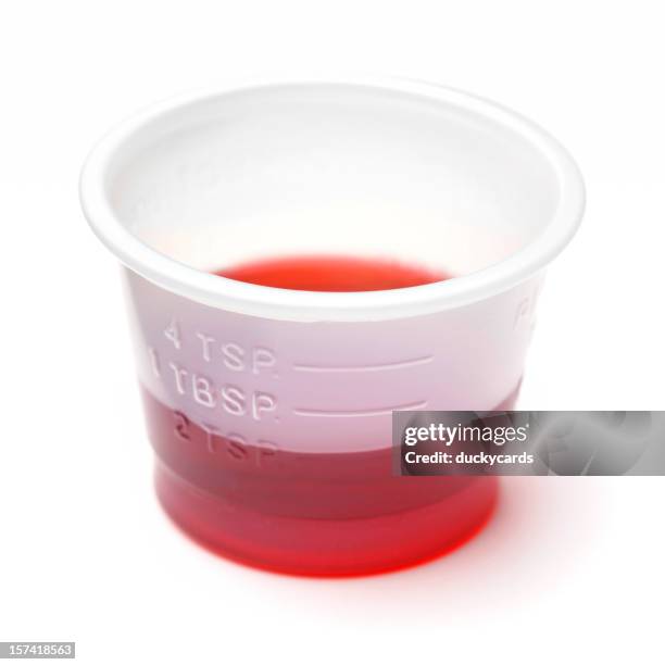 cold or cough syrup medicine - child dose 2t - dose bildbanksfoton och bilder