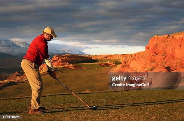 senior caucasian golfer driving on course in southwest - utah mountain range stock pictures, royalty-free photos & images