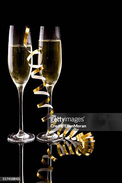 two glasses of champagne with a golden ribbon - gold streamer stock pictures, royalty-free photos & images