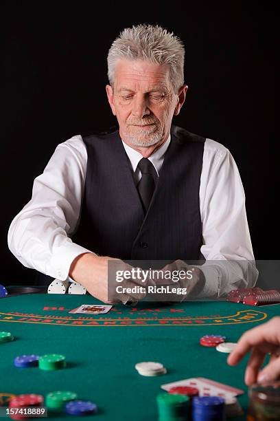 blackjack dealer - casino worker stock pictures, royalty-free photos & images