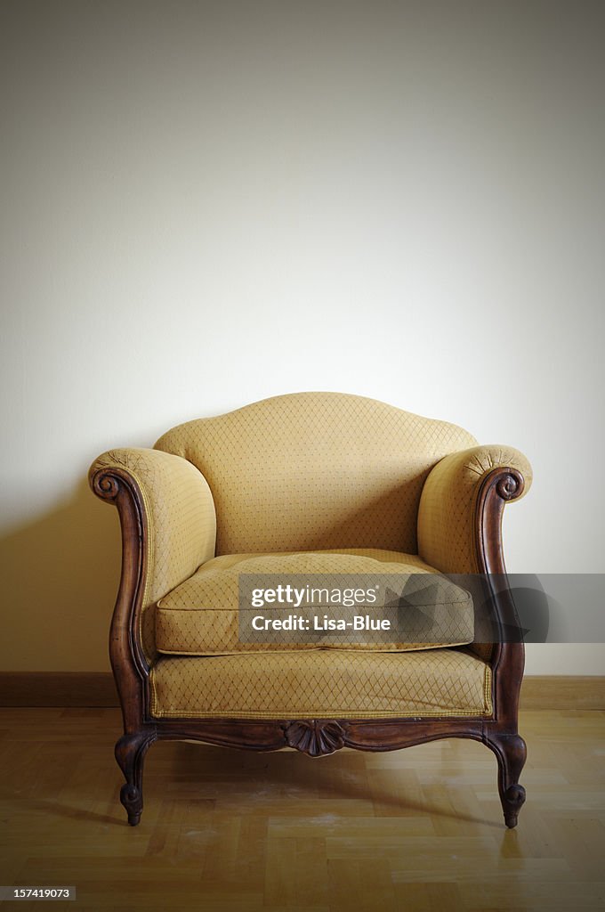 Vintage Yellow Armchair.Copy Space
