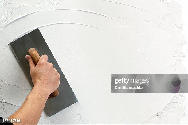 aplicação de gesso - gesso para construção - fotografias e filmes do acervo