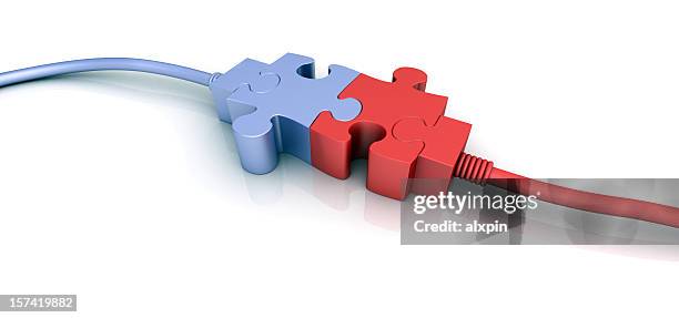 purple and red cord connectors shaped like puzzle pieces - two objects stock pictures, royalty-free photos & images