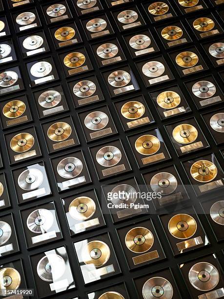 wall of records - trophy wall stock pictures, royalty-free photos & images