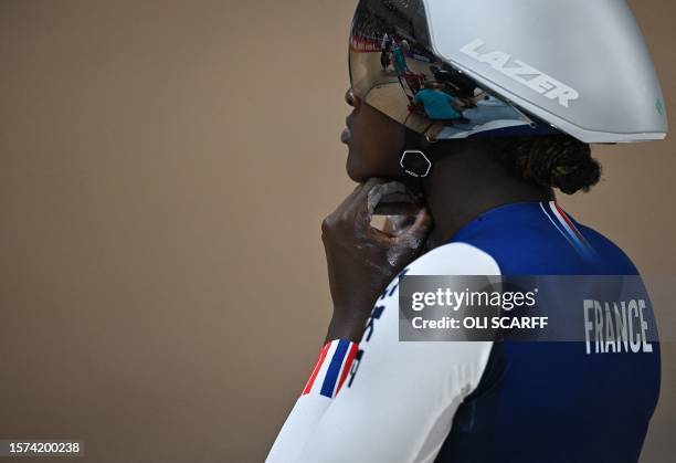 France's Taky Marie Divine Kouame prepares to take part in a women's Elite Team Sprint qualification race at the Sir Chris Hoy velodrome during the...