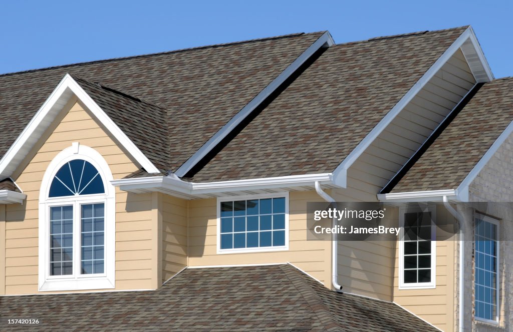 New Residential House; Architectural Asphalt Shingle Roof, Vinyl Siding, Gables