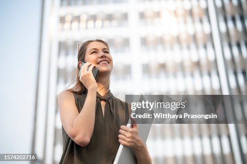 young woman is taking her cv resume to the business district