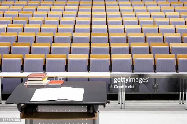 empty lecture hall view from high desk to seat rows - school auditorium stock pictures, royalty-free photos & images