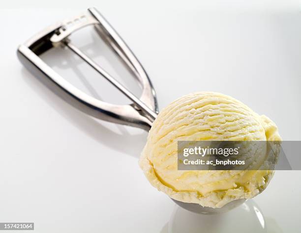 vanilla ice cream still on a scoop - scoop shape stock pictures, royalty-free photos & images