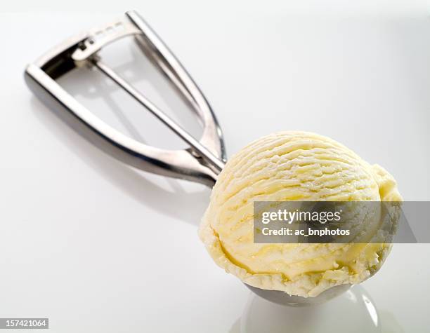 vanilla ice cream still on a scoop - vanilla ice cream stock pictures, royalty-free photos & images