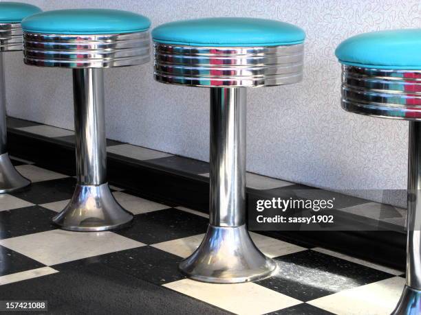 60's diner teal blue bar stools close up - art deco district stock pictures, royalty-free photos & images