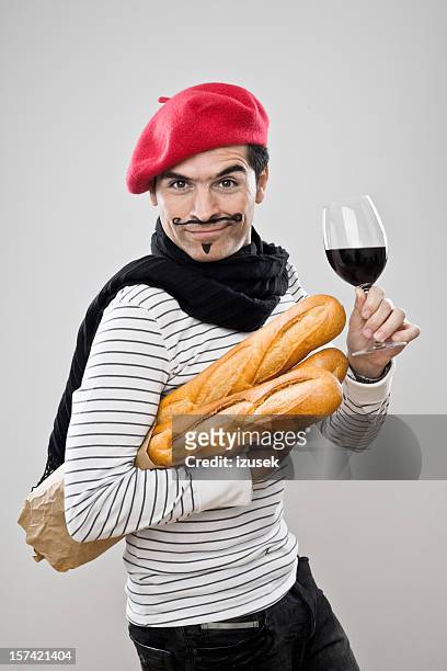 french baguettes and wine - stereotypical stock pictures, royalty-free photos & images
