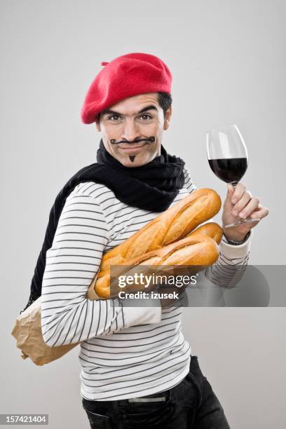 french baguettes and wine - basker bildbanksfoton och bilder