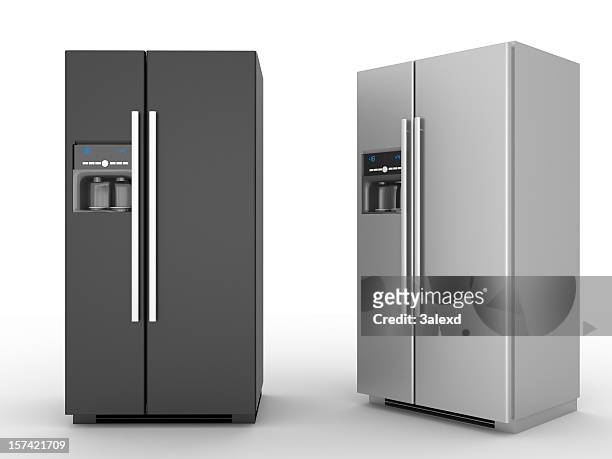 a black refrigerator and a silver refrigerator - refrigerator stock pictures, royalty-free photos & images
