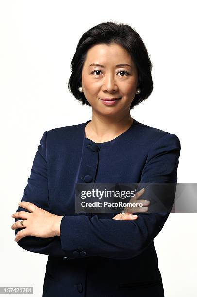 middle-aged asian businesswoman - korean female stock pictures, royalty-free photos & images